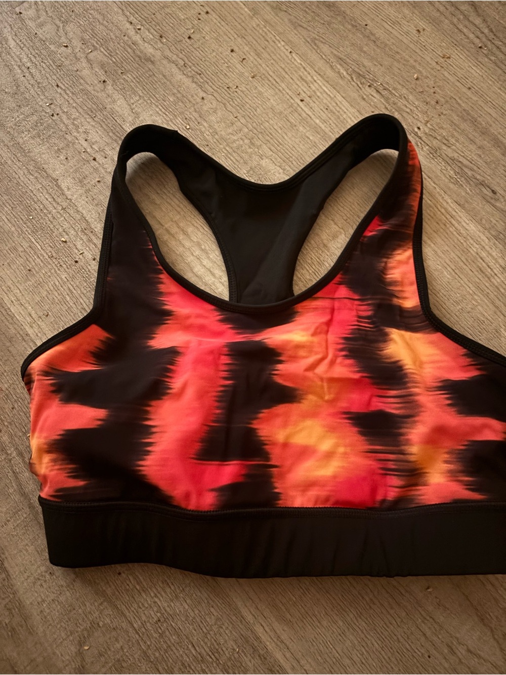 Janji Black Sports Bra with Red & Orange Tie-Dye Front